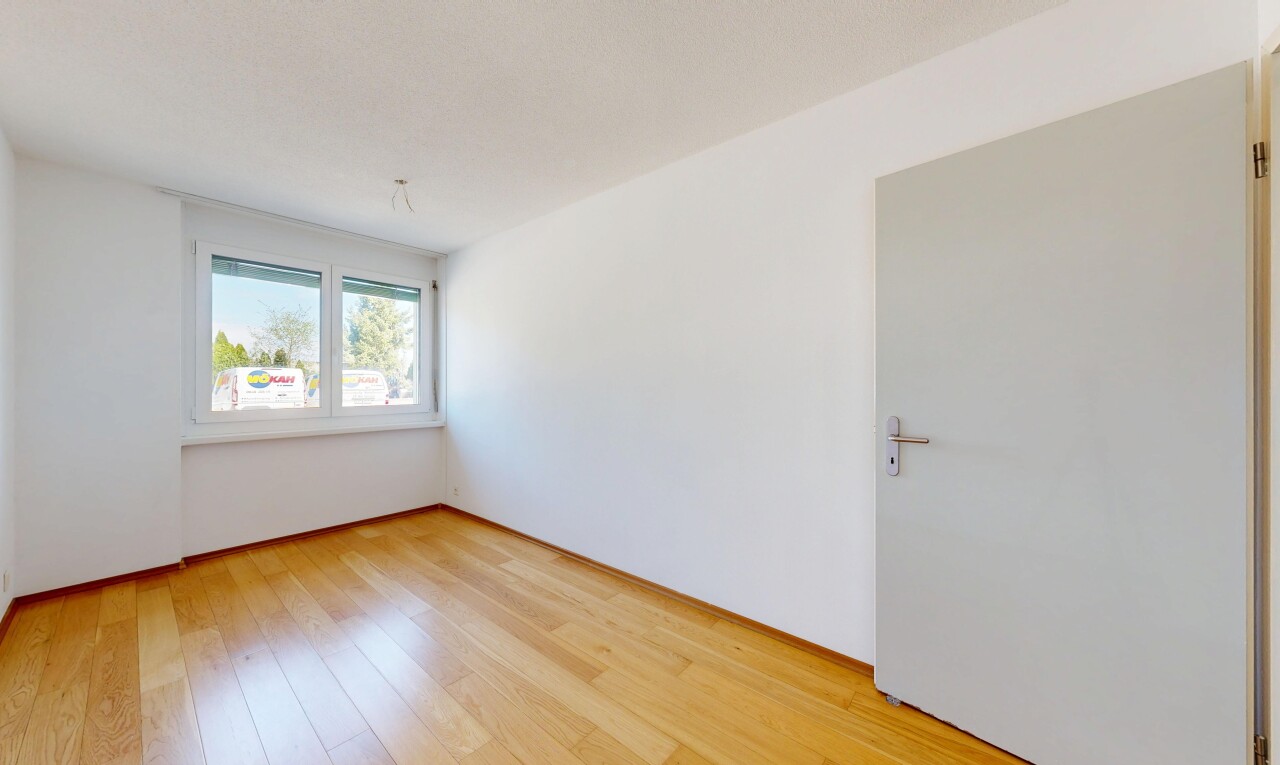 unfurnished room with light wood-style floors