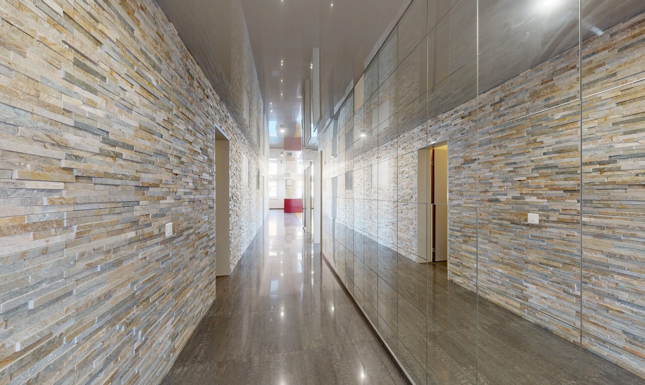 welcome area / building lobby with a high ceiling