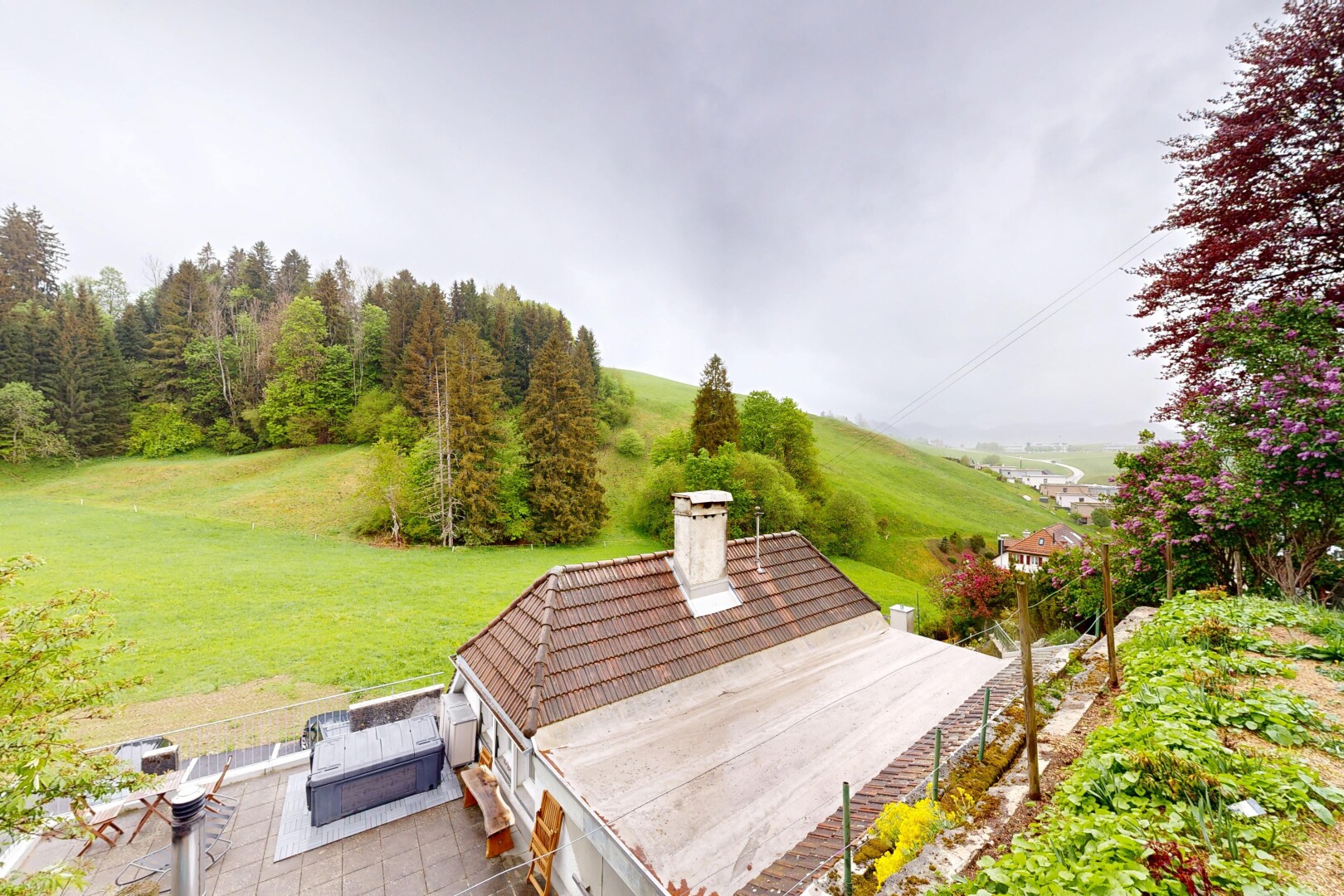 view of property with a chimney and a yard