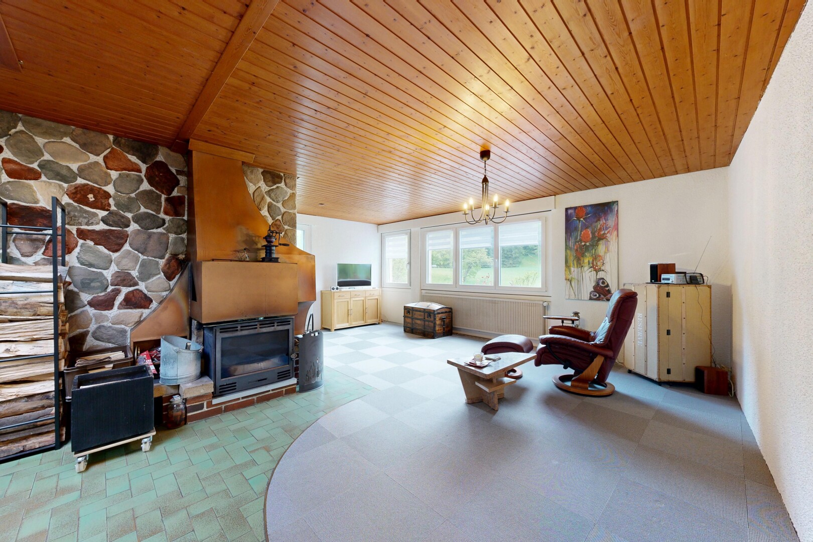 living room with hanging lights, wood ceiling, and light floors