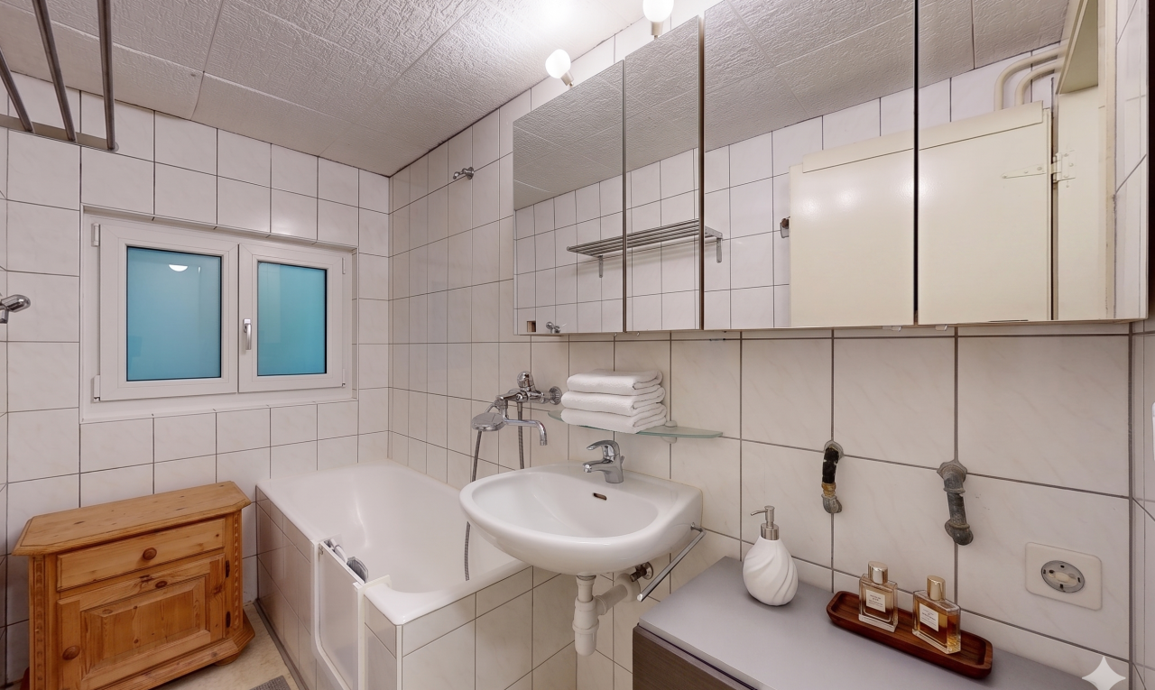 full bathroom with tile walls, tasteful backsplash, and shower / bathtub combination