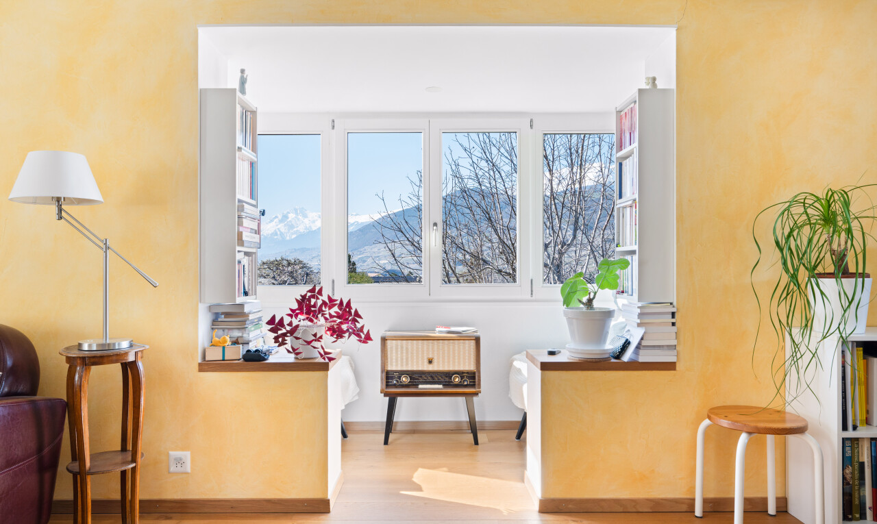 living room with wood finished floors and a mountain view