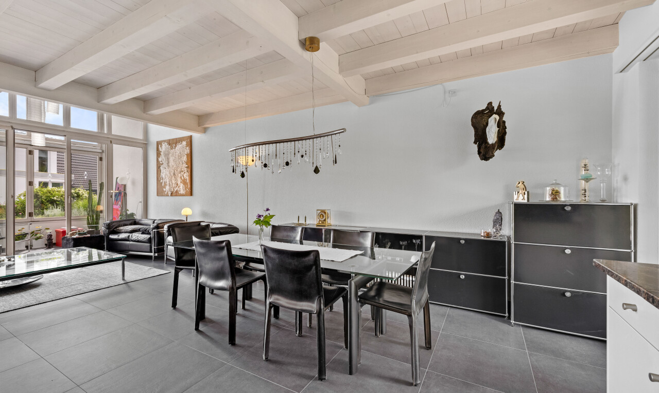 dining space featuring a wooden ceiling with exposed beams and tile patterned floors