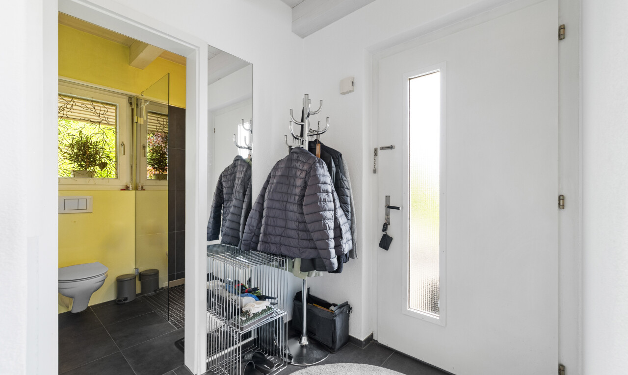 hallway featuring tile patterned floors