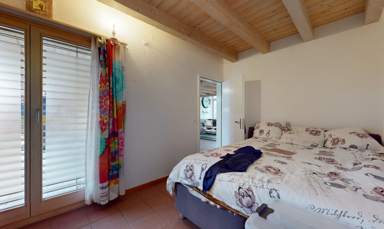 tiled room / bedroom with beamed ceiling, access to exterior, and wooden ceiling