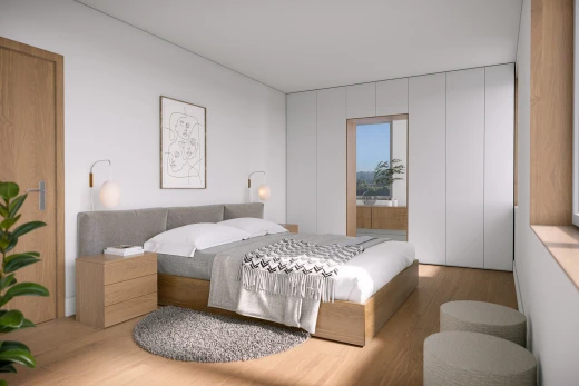chambre avec plancher de bois et lumière naturelle