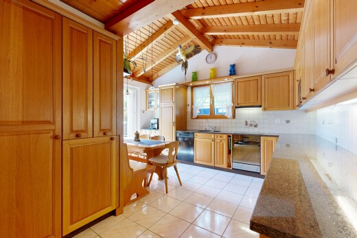 küche mit inside property, light floor, stein arbeitsplatten, stone countertops, und fliesenboden