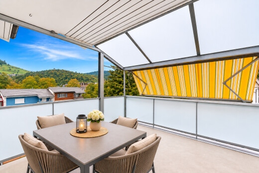 patio / terrace with a mountain view