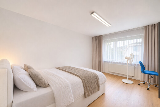 room / bedroom featuring light wood-style floors