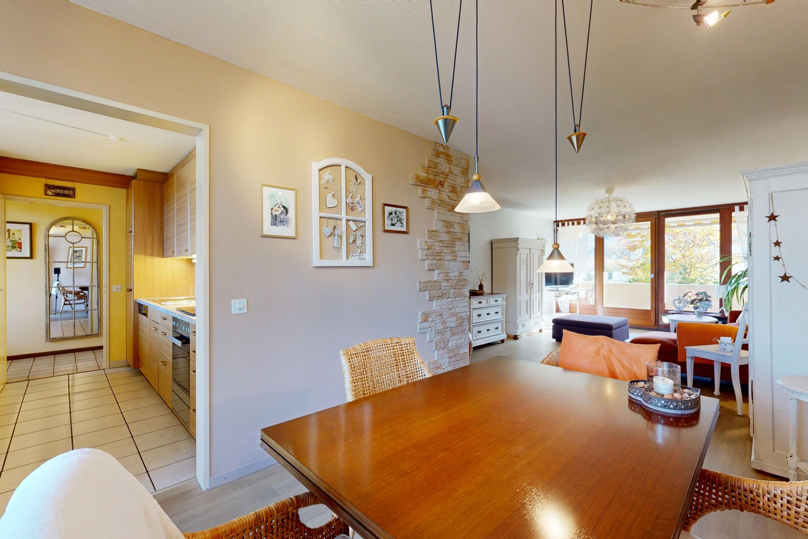 dining space with light tile patterned floors and baseboards