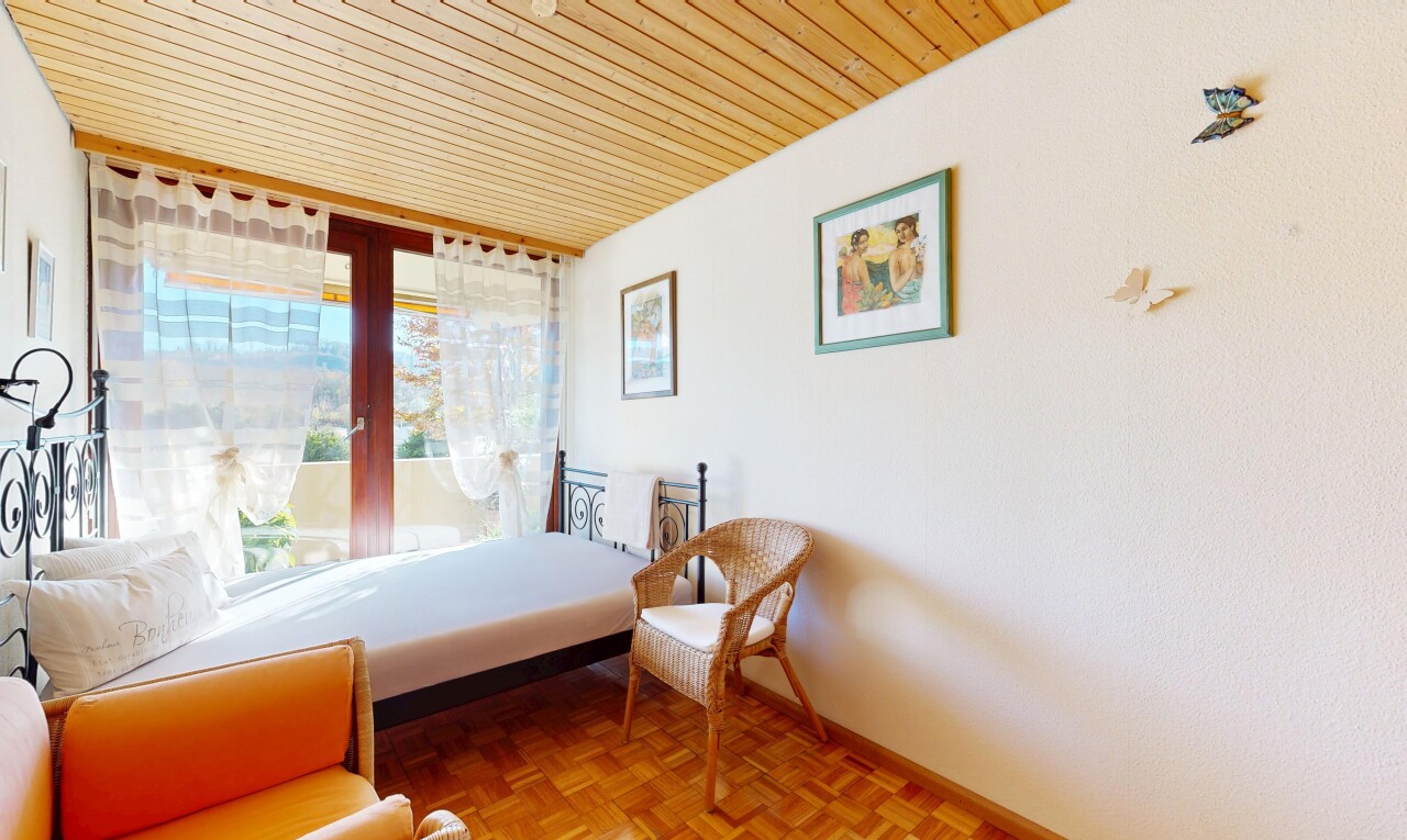 room / bedroom featuring wooden ceiling and baseboards