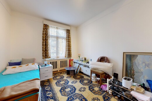 zimmer / schlafzimmer mit drywall, gipskartonwand, inside property, kühler, und natural light