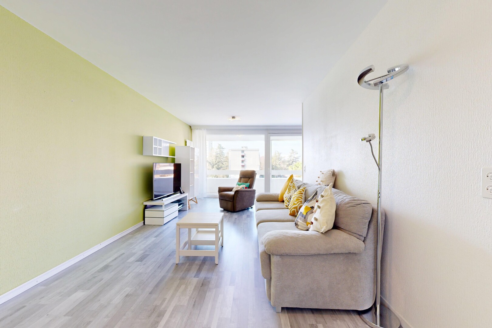 living room with light wood-style floors and baseboards