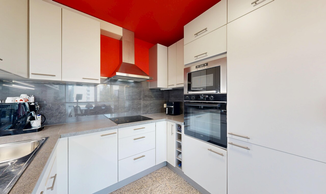 kitchen with decorative backsplash, white cabinetry, dark speckled floor, black electric stovetop, and stainless steel double oven
