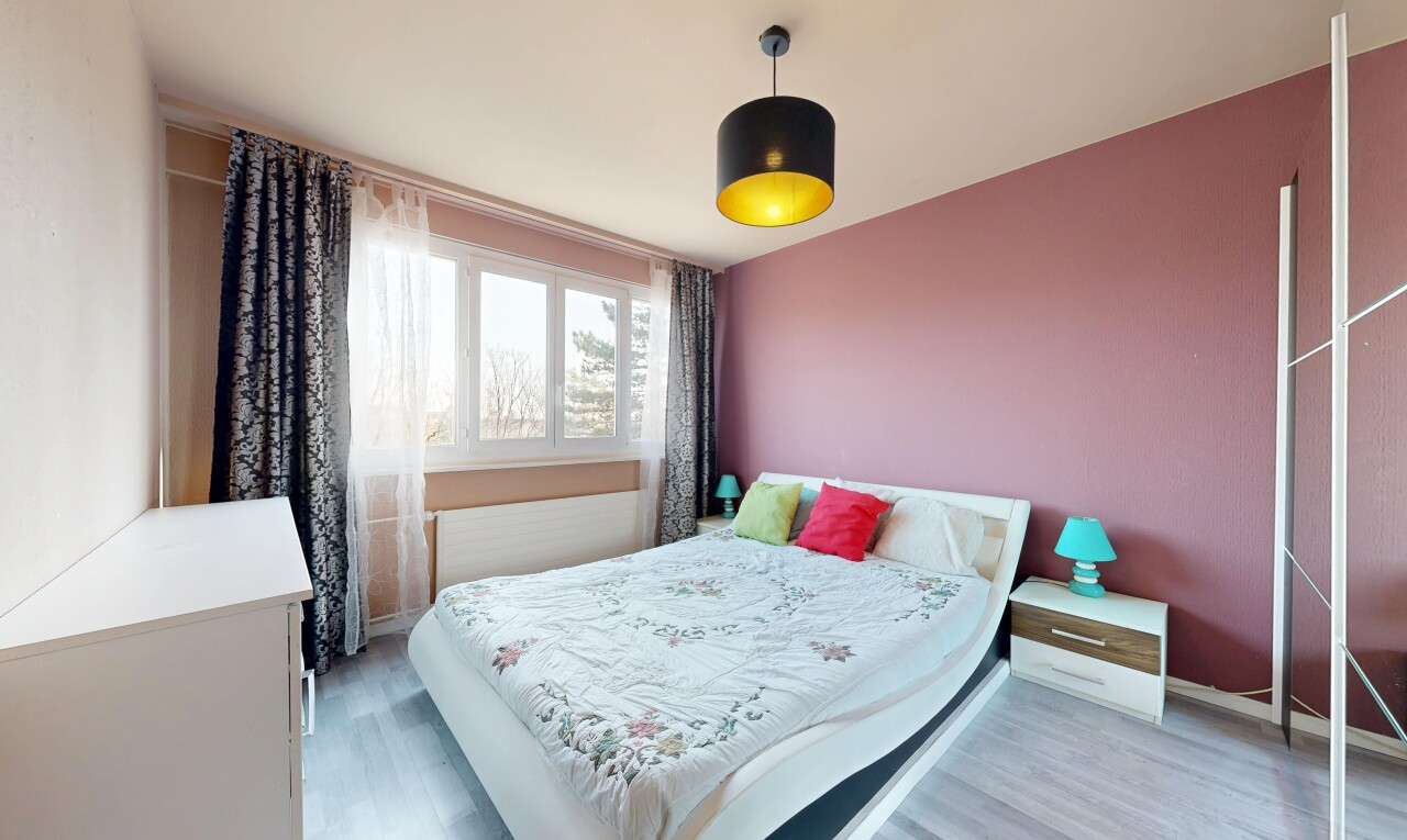 room / bedroom with light wood-style floors and baseboards