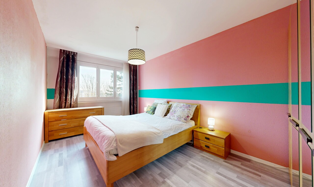 room featuring light wood-style flooring and baseboards