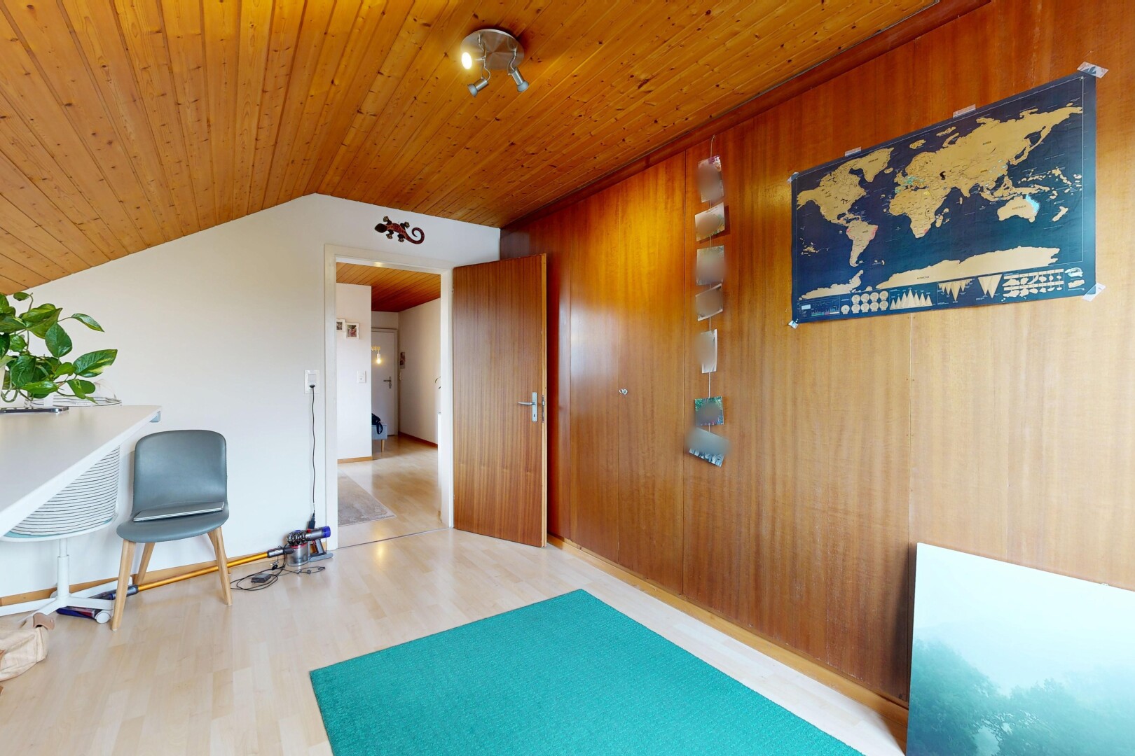 corridor featuring wood finished floors and wood ceiling