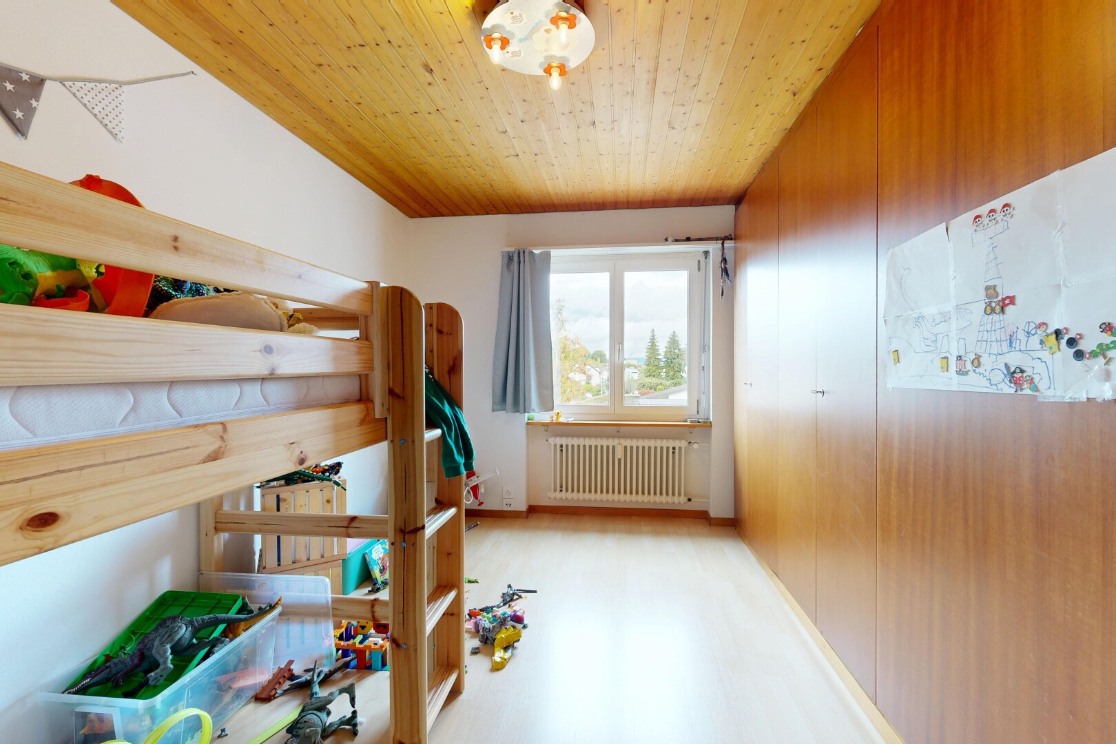 room / bedroom with radiator heating unit and wooden ceiling