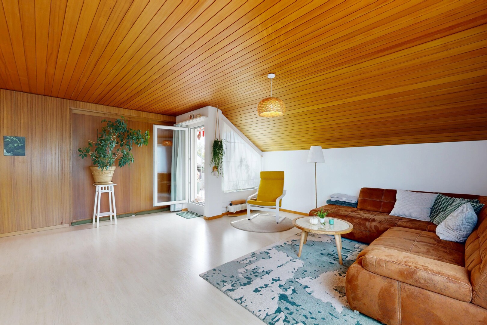 living area with wooden ceiling and wood finished floors