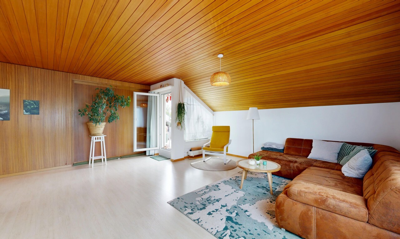 living area with wooden ceiling and wood finished floors