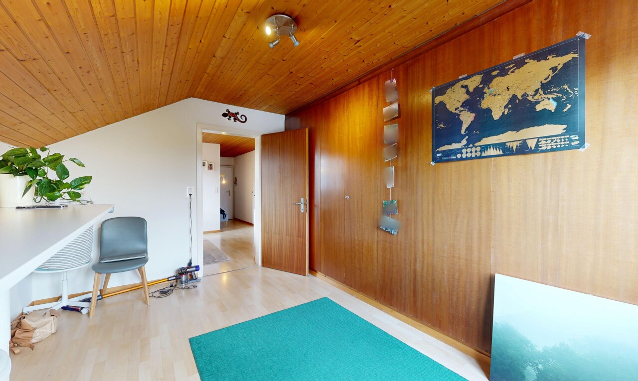corridor featuring wood finished floors and wood ceiling