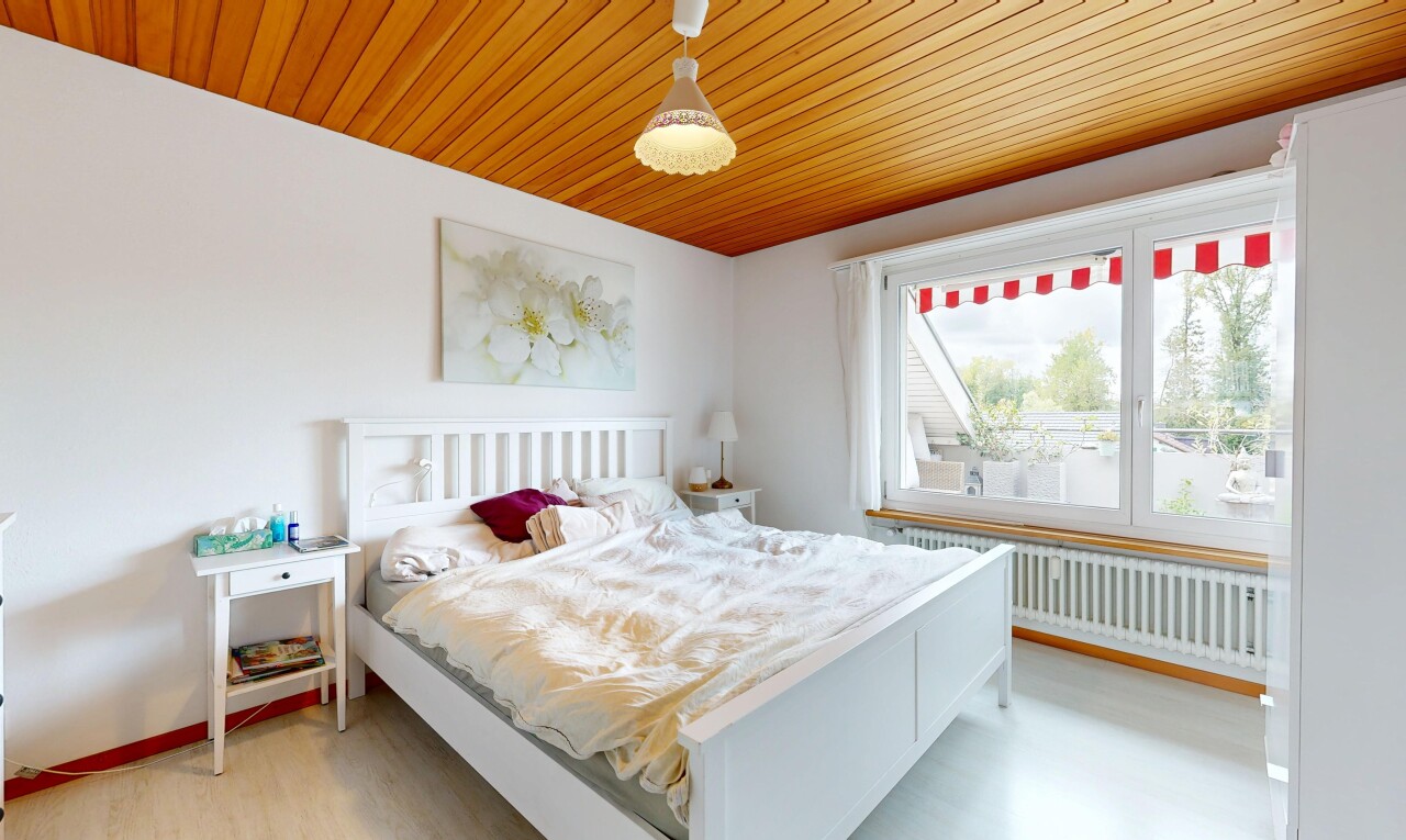 room featuring radiator, light wood finished floors, and wood ceiling