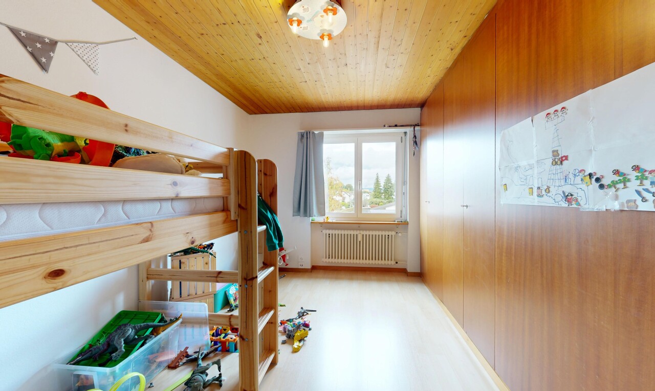 room / bedroom with radiator heating unit and wooden ceiling