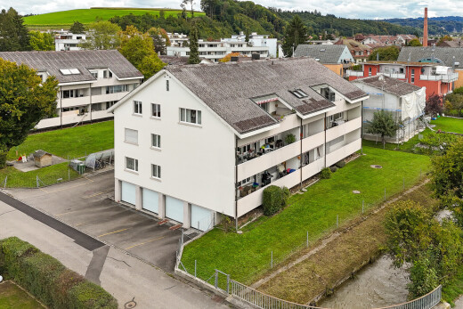 außenansicht mit auffahrt, residential view, wohngebietblick, drone view, und stuckverkleidung