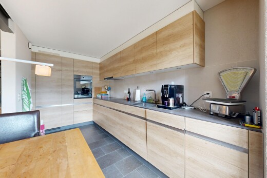 küche mit hellbraune schränke, light brown cabinets, dark floor, inside community, und ofen
