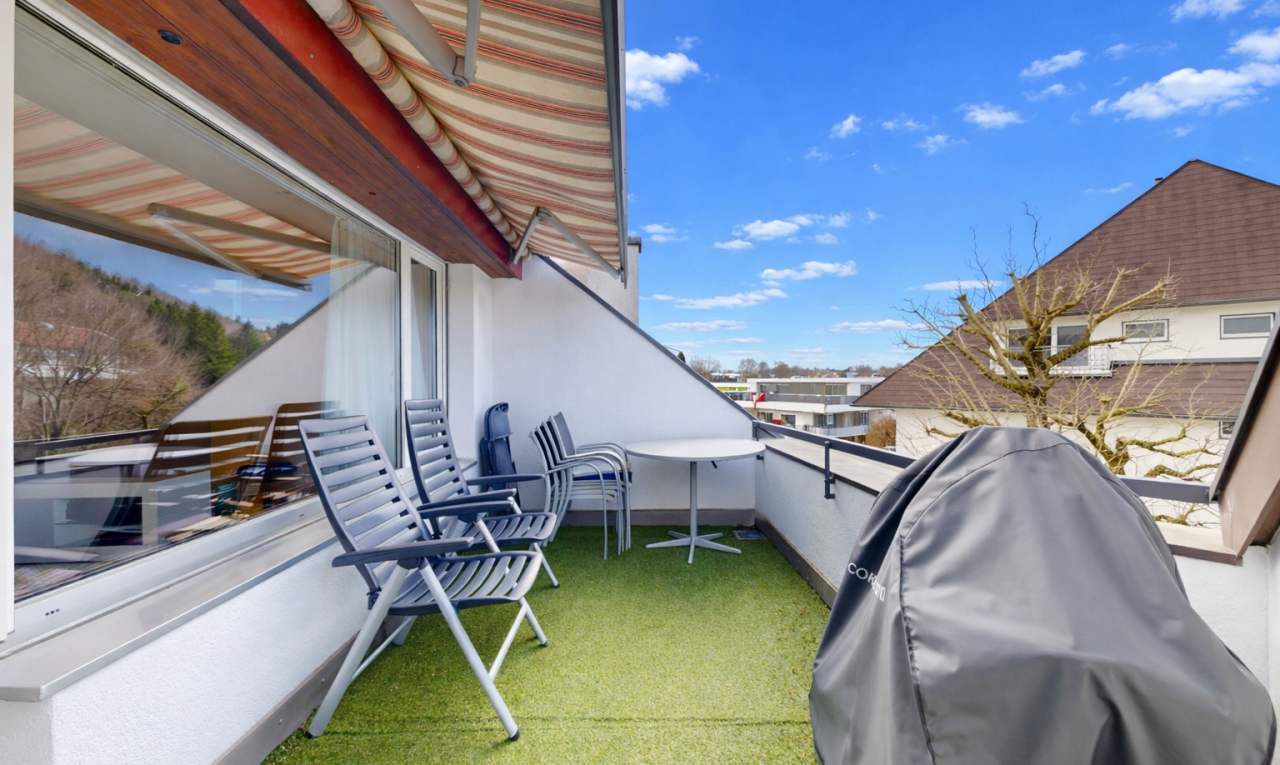 terrace featuring a grill and a patio area