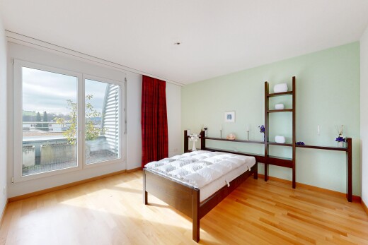 room featuring light wood-style flooring and baseboards