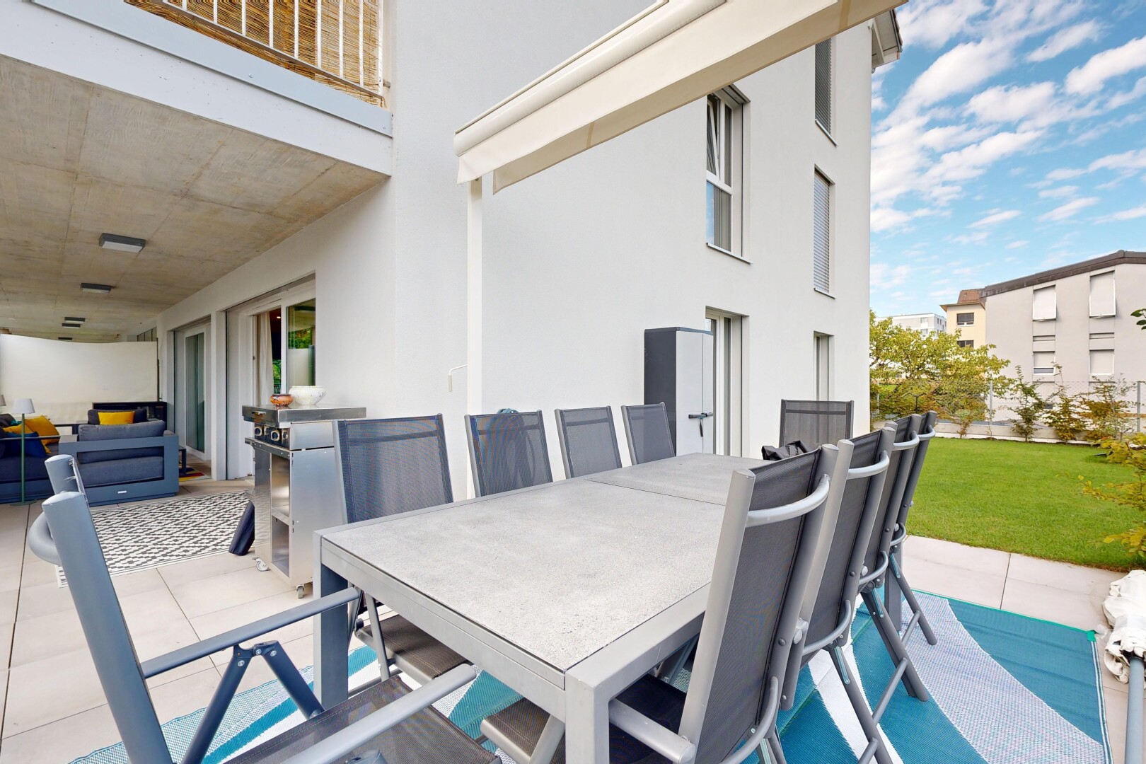 terrace with a patio area, outdoor dining area, and a balcony