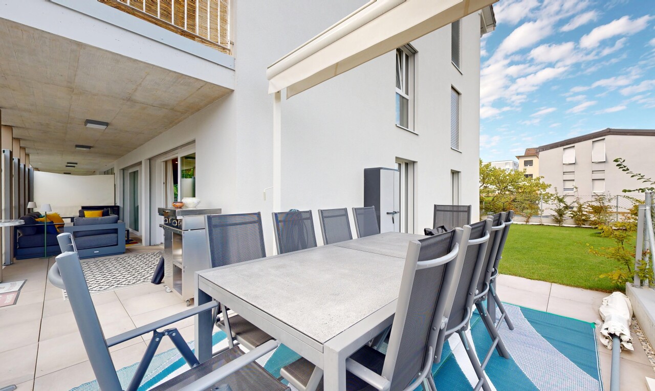 terrace with a patio area, outdoor dining area, and a balcony