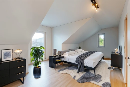 room / bedroom with light wood-type flooring and vaulted ceiling