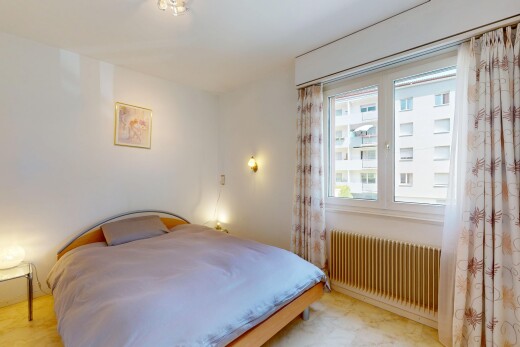chambre avec radiateur, lumière naturelle, et cloison sèche