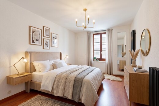 empty room featuring wood finished floors and baseboards