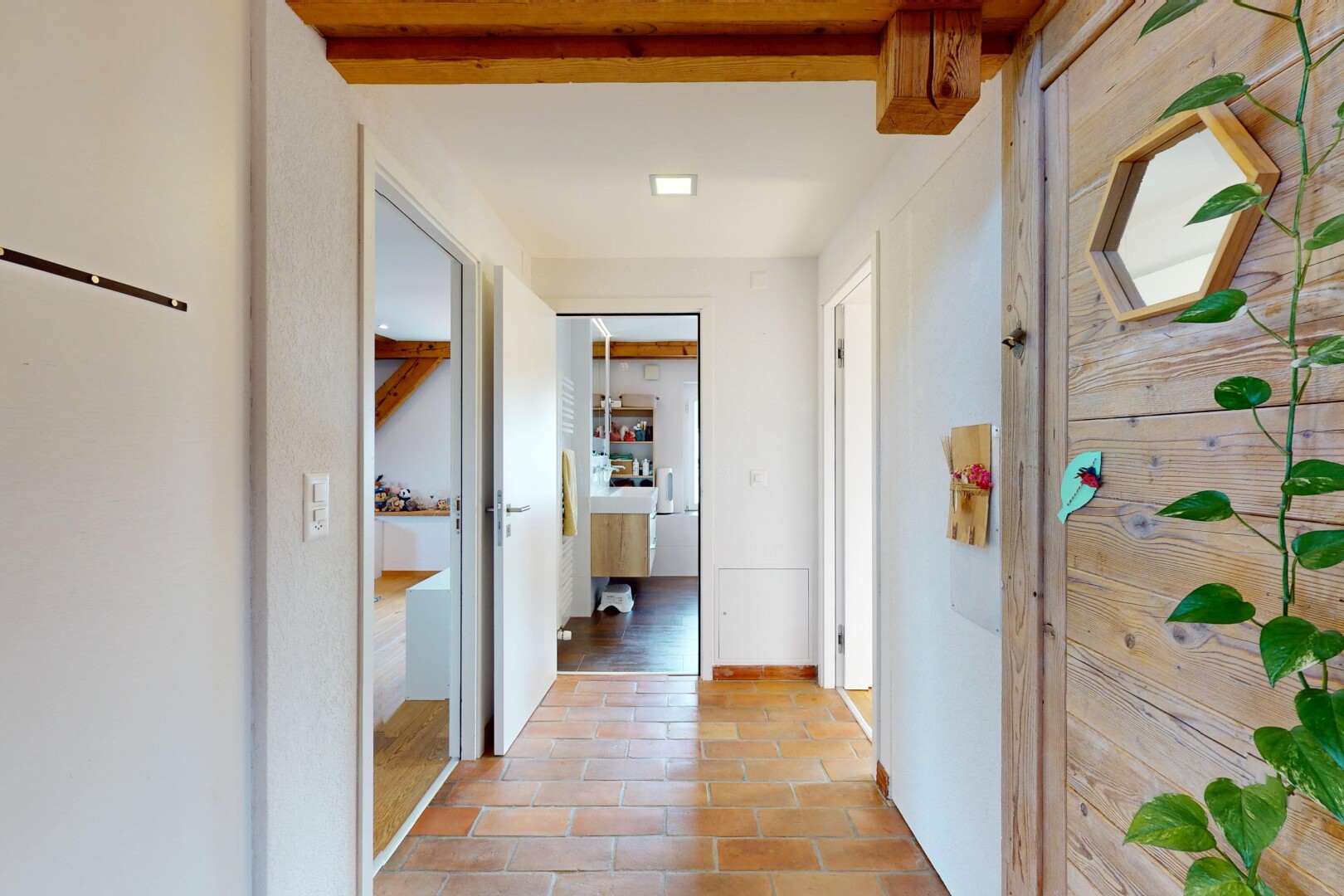 hallway featuring tile patterned floors