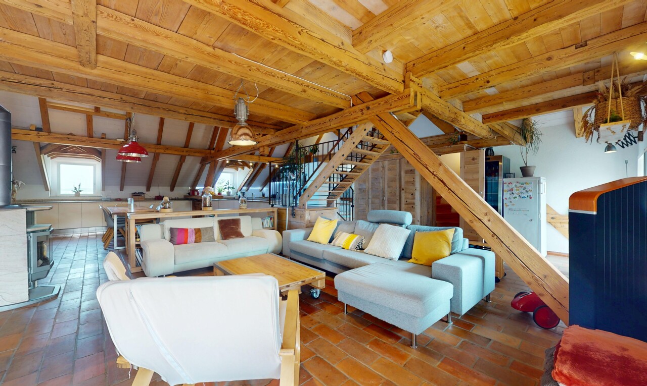 living room with stairs and a wooden ceiling with exposed beams