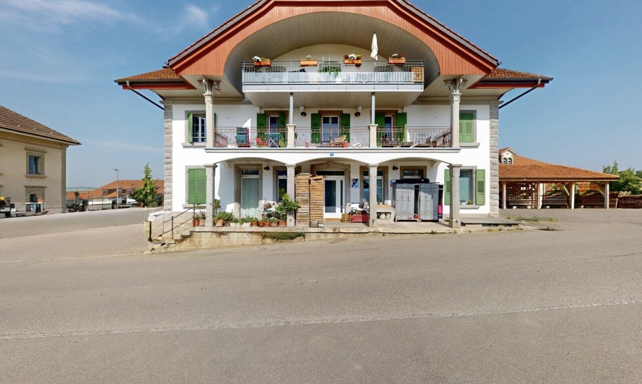 view of home with a balcony