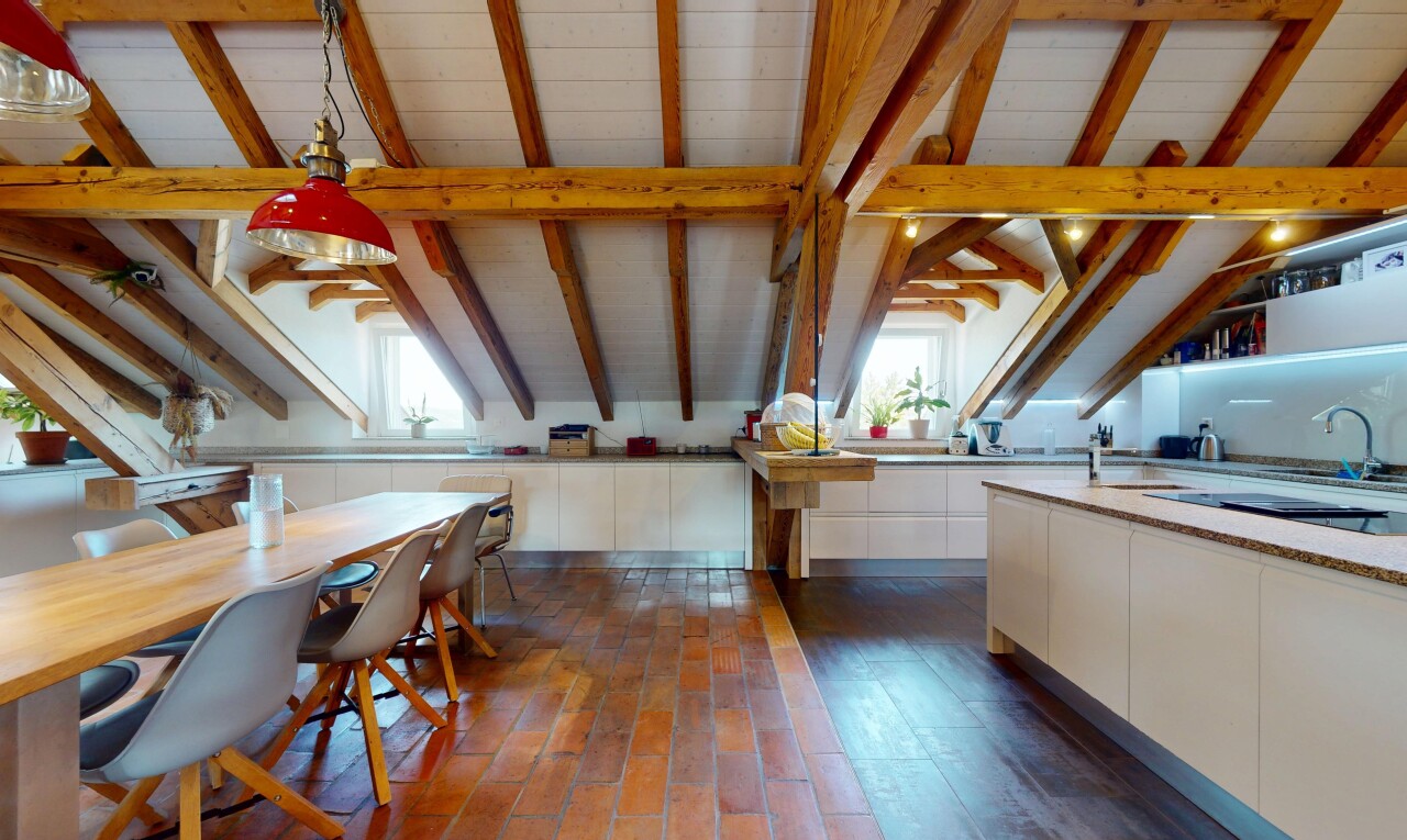 kitchen with white cabinetry, modern cabinets, wooden ceiling, light countertops, and black electric cooktop