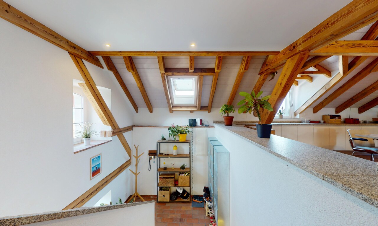 staircase with recessed lighting