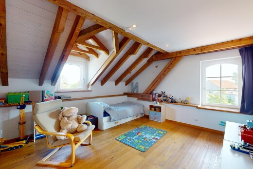 room / bedroom with multiple windows, wood finished floors, and recessed lighting