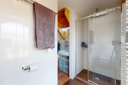 bathroom with a shower stall