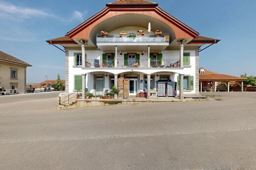 view of home with a balcony