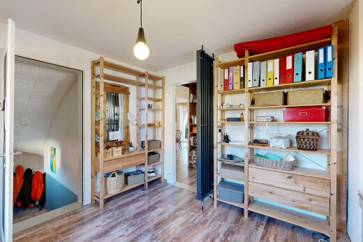 room / bedroom with wood finished floors