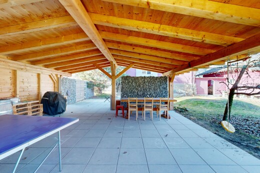terrace with a patio and grilling area