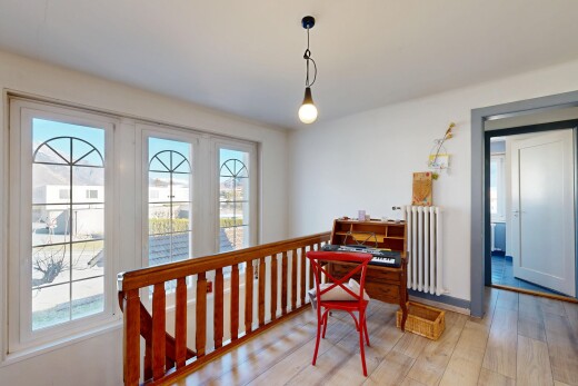 interior space featuring radiator and wood finished floors