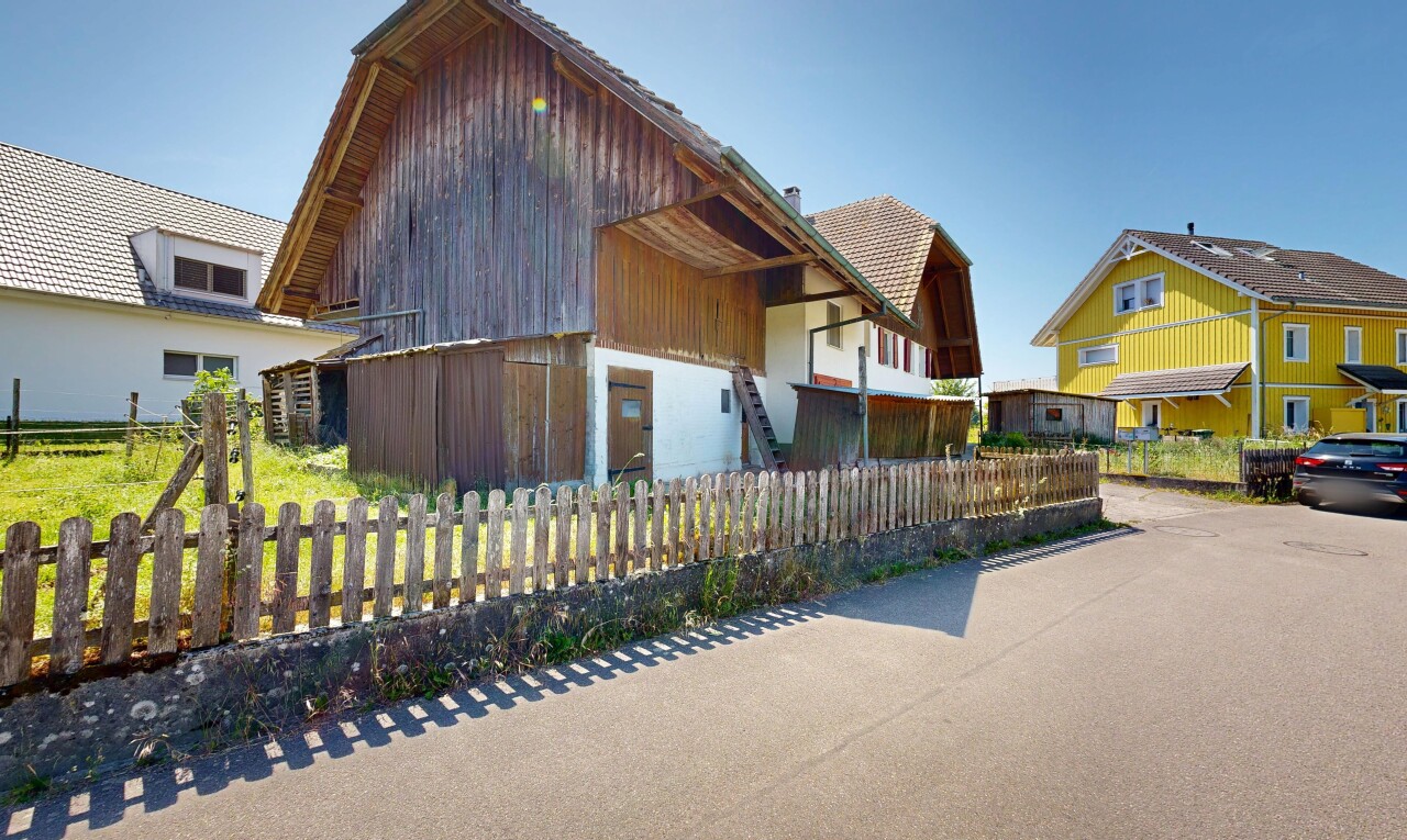 outdoor house with a residential view and a barn