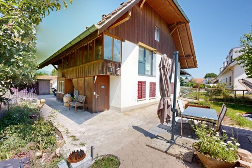 outdoor house featuring a patio area