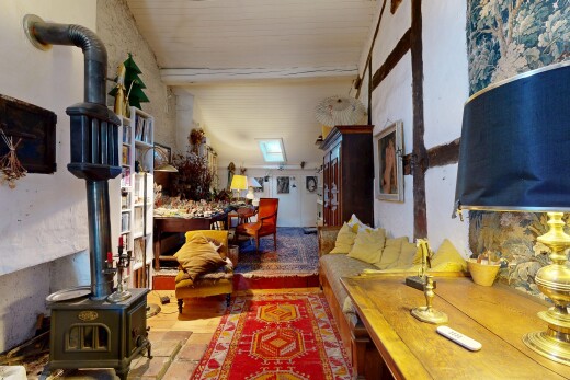 wohnzimmer mit holzofen und inside property